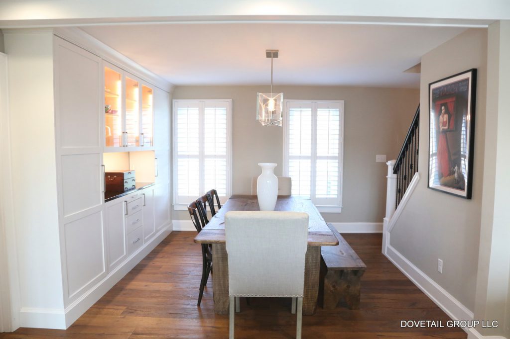 table with vase in dining room